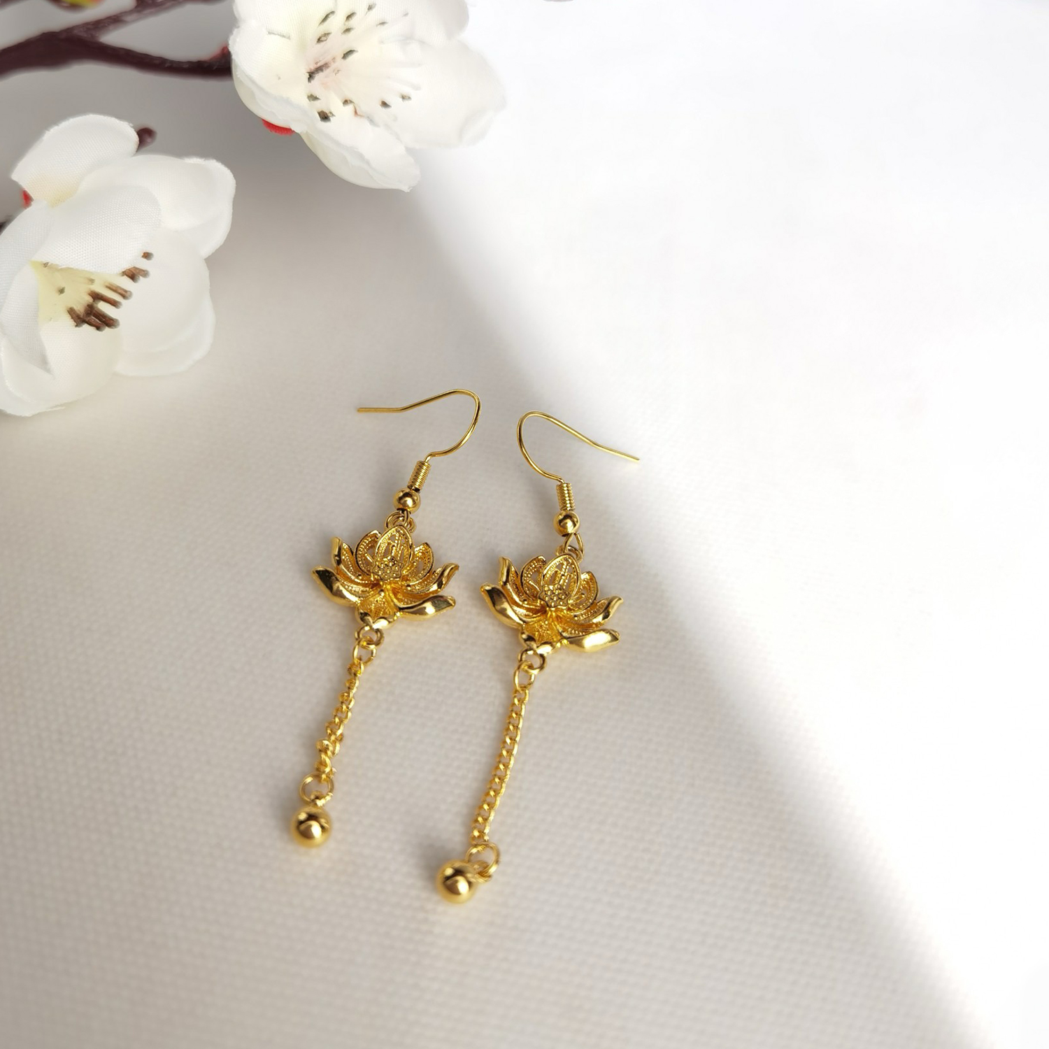 Alluvial Gold Vacuum Electroplating 24K Gold Lotus Tassel Earrings
