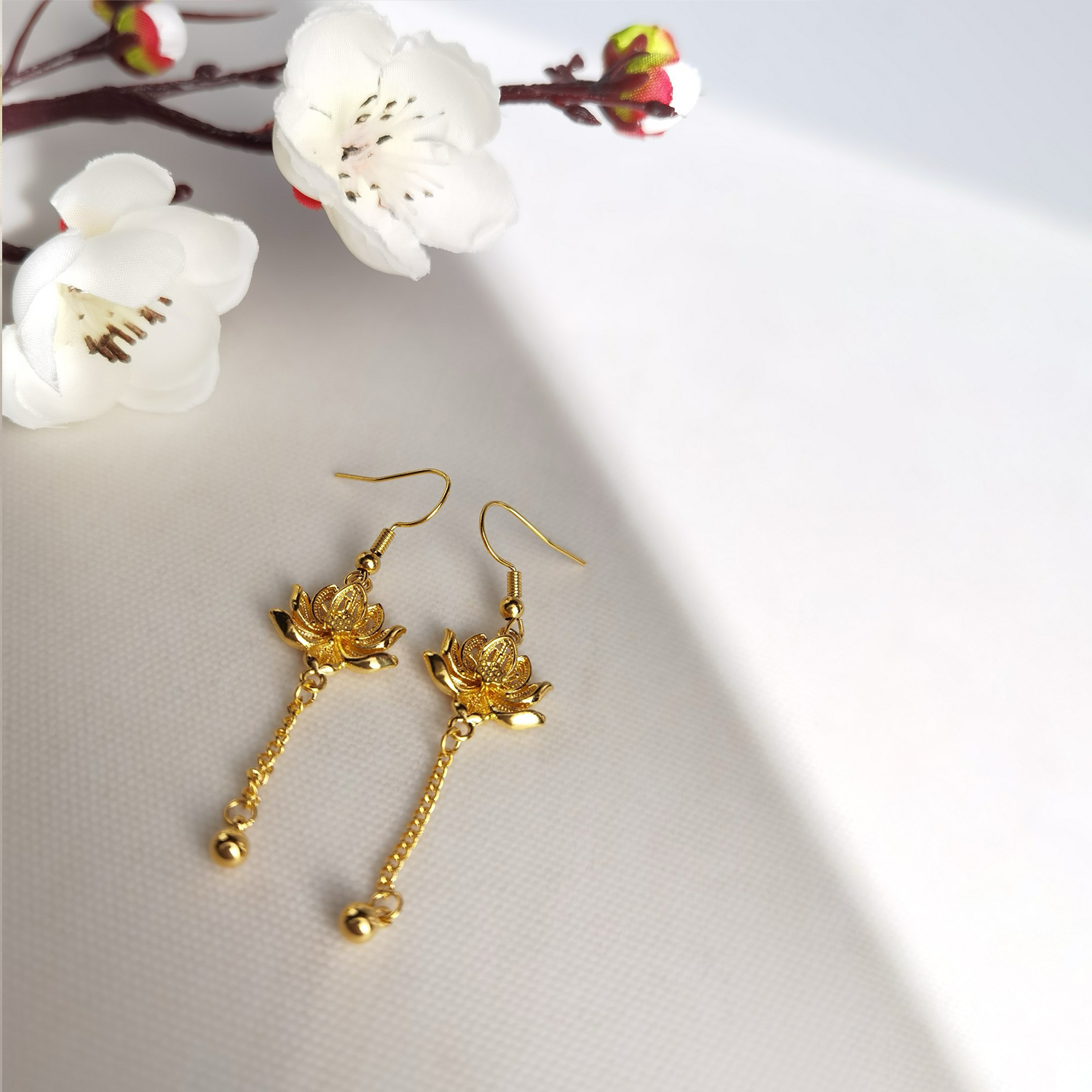 Alluvial Gold Vacuum Electroplating 24K Gold Lotus Tassel Earrings