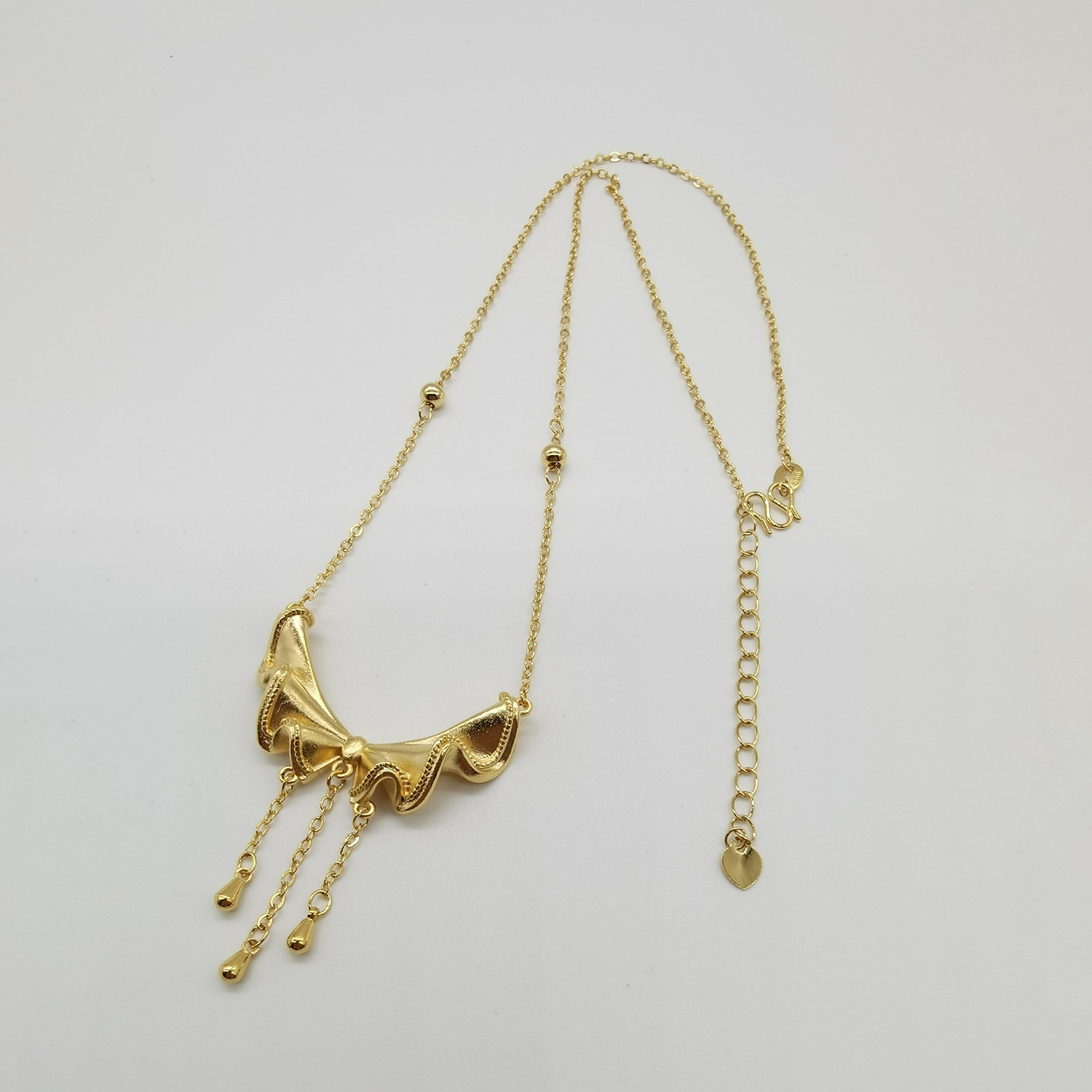 Alluvial gold vacuum electroplating 24K gold bow tassel necklace